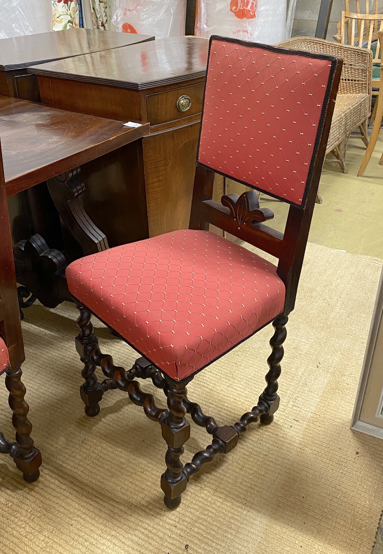 A Spanish style walnut rectangular refectory table, length 168cm, depth 84cm, height 78cm and six matching chairs